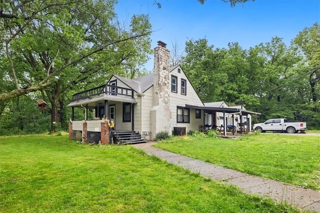 7508 Walnut St, Pleasant Valley, MO 64068 - view of side of home with a yard, a chimney, central AC, and a porch