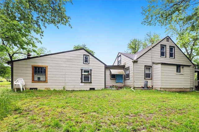 7508 Walnut St, Pleasant Valley, MO 64068 - rear view of house featuring a yard