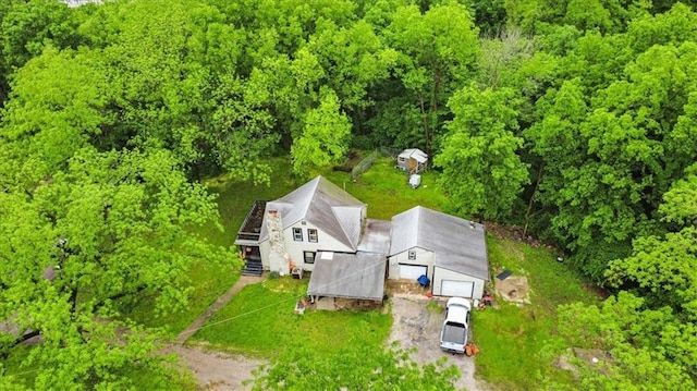 7508 Walnut St, Pleasant Valley, MO 64068 - view of subject property with a heavily wooded area