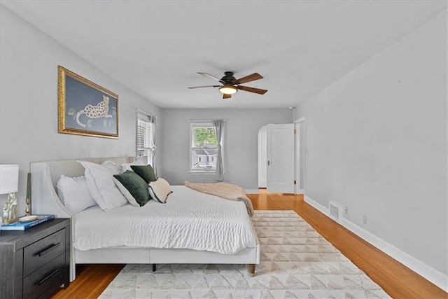 7224 Ward Pkwy, Kansas City, MO 64114 - bedroom featuring wood finished floors, ceiling fan, and baseboards