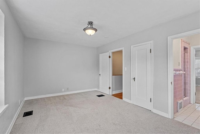 7224 Ward Pkwy, Kansas City, MO 64114 - unfurnished bedroom featuring carpet, baseboards, and connected bathroom