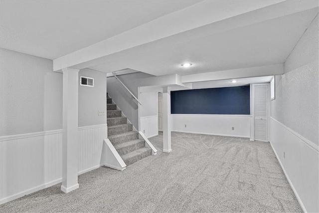 7224 Ward Pkwy, Kansas City, MO 64114 - finished basement with a wainscoted wall, carpet flooring, and stairs