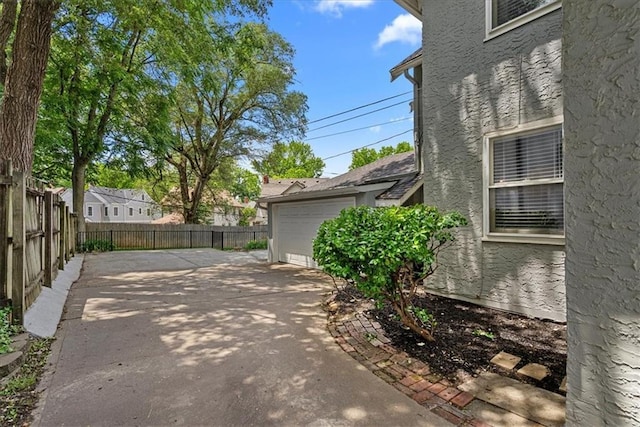 7224 Ward Pkwy, Kansas City, MO 64114 - view of patio with a garage