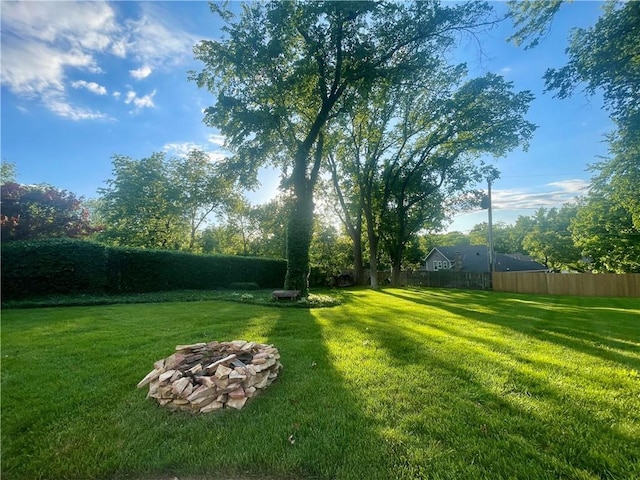8122 Parkhill Rd, Lenexa, KS 66215 - view of yard featuring an outdoor fire pit