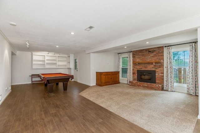 8122 Parkhill Rd, Lenexa, KS 66215 - game room with baseboards, ornamental molding, billiards table, wood finished floors, and built in shelves