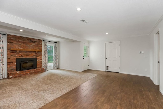8122 Parkhill Rd, Lenexa, KS 66215 - unfurnished living room with baseboards, crown molding, wood finished floors, recessed lighting, and a fireplace