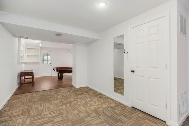 8122 Parkhill Rd, Lenexa, KS 66215 - hallway featuring baseboards, parquet flooring, and recessed lighting