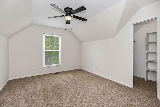 8122 Parkhill Rd, Lenexa, KS 66215 - bonus room with carpet flooring, vaulted ceiling, a ceiling fan, and baseboards