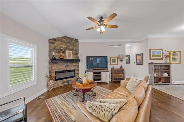 4500 Valley Ridge Dr, Saint Joseph, MO 64505 - living area with ceiling fan, a fireplace, baseboards, wood finished floors, and vaulted ceiling