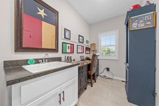 4500 Valley Ridge Dr, Saint Joseph, MO 64505 - bathroom with vanity, tile patterned floors, and baseboards