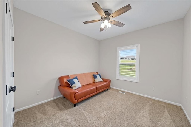 4500 Valley Ridge Dr, Saint Joseph, MO 64505 - living area with baseboards, carpet floors, and ceiling fan