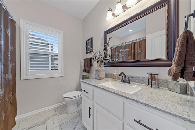 4500 Valley Ridge Dr, Saint Joseph, MO 64505 - full bathroom featuring marble finish floors, baseboards, vanity, and toilet