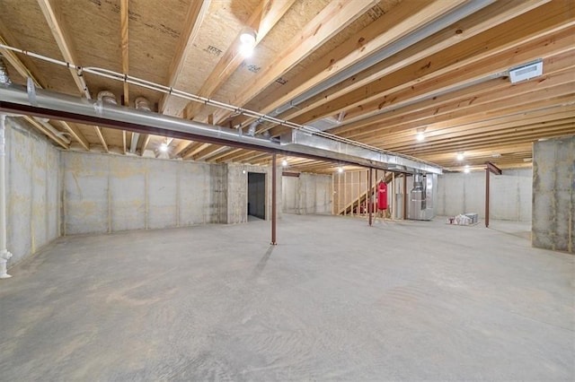 4500 Valley Ridge Dr, Saint Joseph, MO 64505 - unfinished below grade area featuring heating unit and stairway