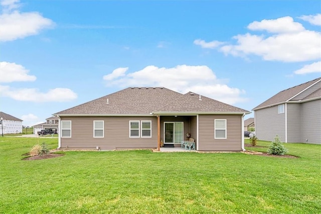 4500 Valley Ridge Dr, Saint Joseph, MO 64505 - rear view of house with a patio area and a yard