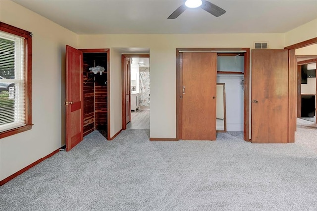 10855 72nd Rd, Agency, MO 64401 - unfurnished bedroom with carpet flooring, baseboards, and a ceiling fan