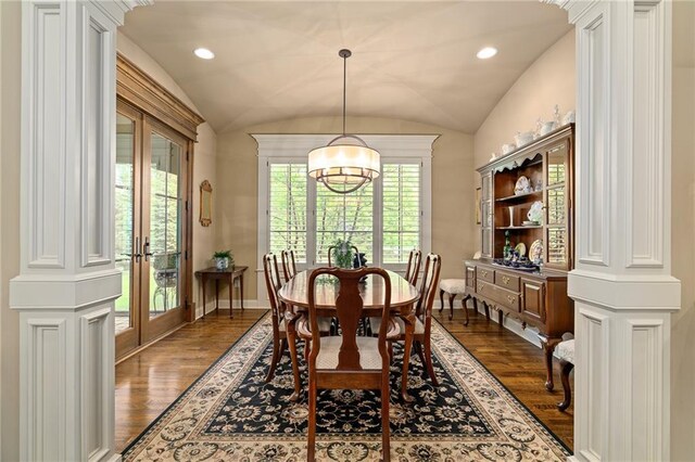 3116 W 137th St, Leawood, KS 66224 - dining room featuring dark wood-style flooring, baseboards, lofted ceiling, french doors, and ornate columns