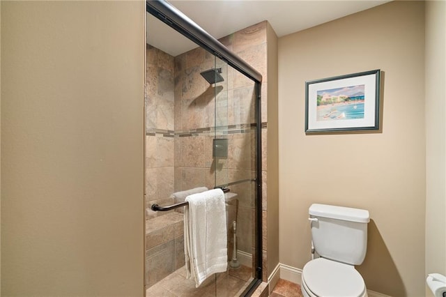 3116 W 137th St, Leawood, KS 66224 - bathroom with toilet, a shower stall, and tile patterned floors