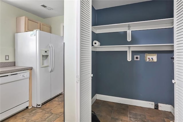 906 W 84th St, Kansas City, MO 64114 - kitchen with white appliances, light brown cabinetry, and baseboards