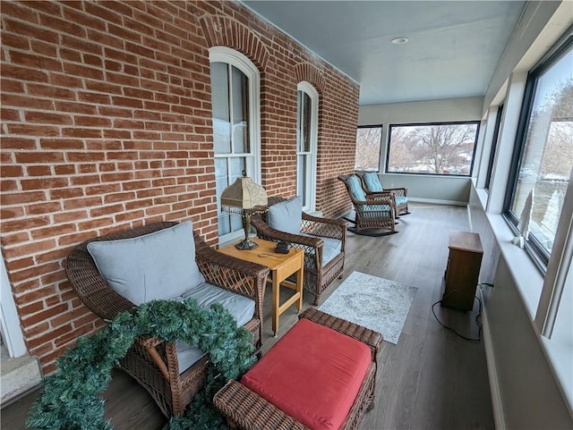 433 W State St, Troy, KS 66087 - sunroom featuring wood finished floors, healthy amount of natural light, baseboards, and recessed lighting