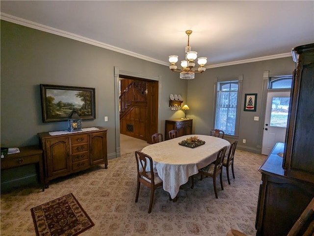 433 W State St, Troy, KS 66087 - dining space featuring a chandelier, ornamental molding, and baseboards