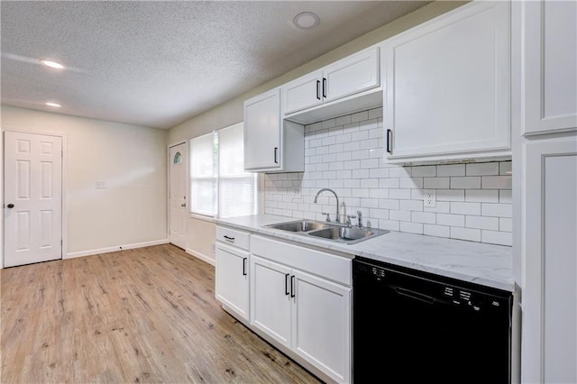 10711 Bennington Ave, Kansas City, MO 64134 - kitchen featuring dishwasher, a sink, baseboards, decorative backsplash, and white cabinetry