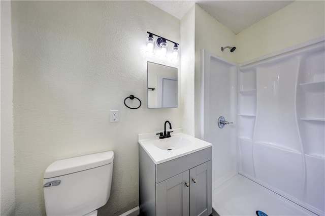 10711 Bennington Ave, Kansas City, MO 64134 - bathroom with vanity, a shower, and toilet