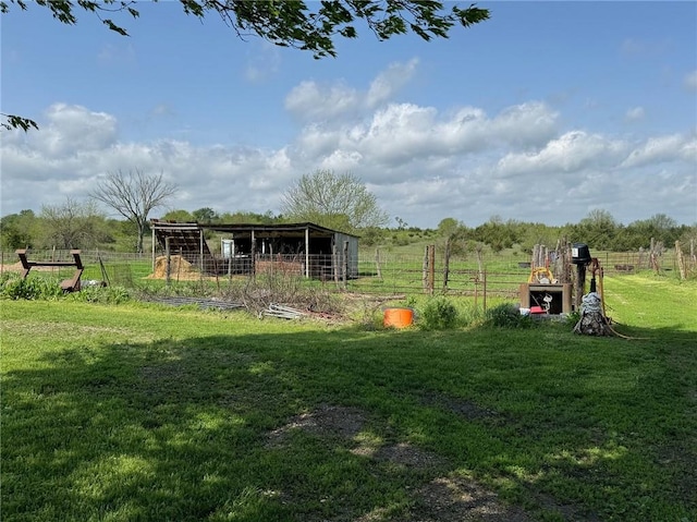 476 170th St, Fort Scott, KS 66701 - view of yard featuring an outdoor structure and a rural view