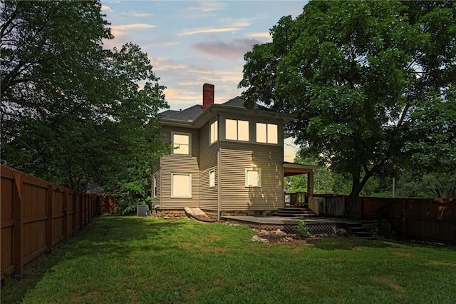 121 E Nichols St, Spring Hill, KS 66083 - back of house with a chimney