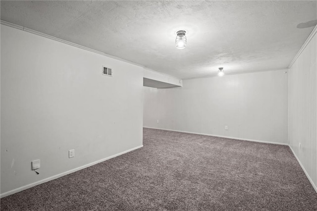 17207 E Swope Ln, Independence, MO 64056 - finished below grade area featuring carpet floors, a textured ceiling, baseboards, and crown molding