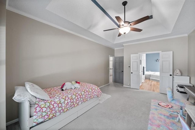 6221 W 126th Ter, Overland Park, KS 66209 - carpeted bedroom featuring a raised ceiling, crown molding, connected bathroom, and a ceiling fan