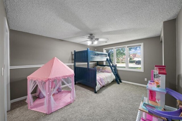 6221 W 126th Ter, Overland Park, KS 66209 - bedroom featuring carpet floors, a textured ceiling, and ceiling fan