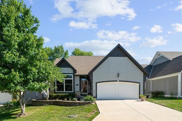 6221 W 126th Ter, Overland Park, KS 66209 - view of front facade with an attached garage, a front lawn, concrete driveway, stucco siding, and roof with shingles