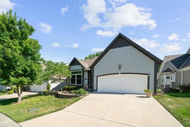 6221 W 126th Ter, Overland Park, KS 66209 - single story home with driveway, an attached garage, a front lawn, and stucco siding