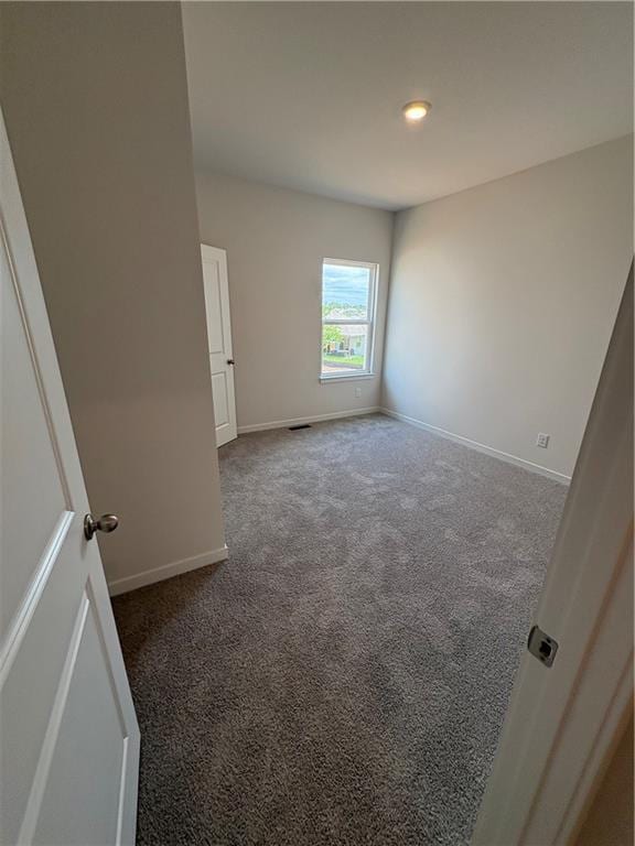 19605 W 200th St, Spring Hill, KS 66083 - spare room featuring carpet flooring, baseboards, and recessed lighting