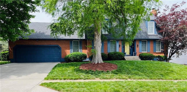 13106 E 57th St, Kansas City, MO 64133 - cape cod-style house with an attached garage, driveway, a front yard, and a shingled roof