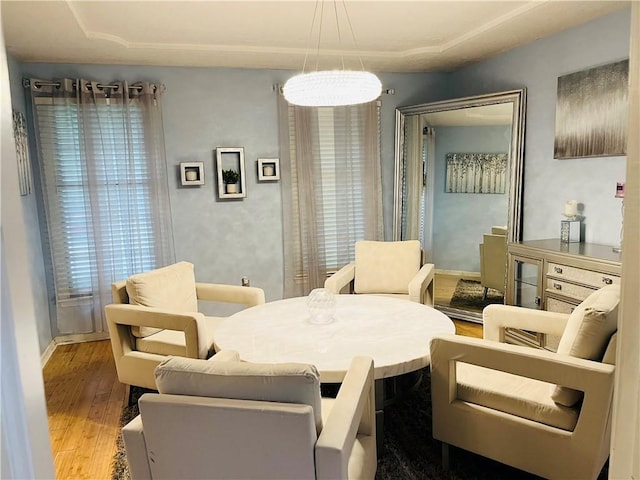 13106 E 57th St, Kansas City, MO 64133 - dining room featuring wood finished floors and baseboards