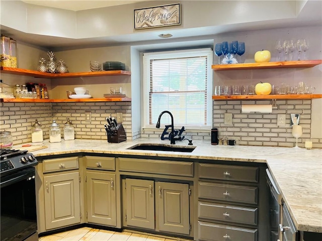 13106 E 57th St, Kansas City, MO 64133 - kitchen featuring a sink, open shelves, black range with gas cooktop, decorative backsplash, and gray cabinets