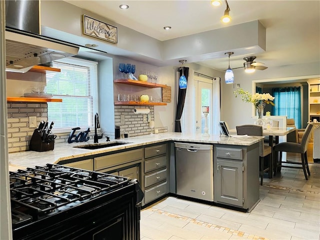 13106 E 57th St, Kansas City, MO 64133 - kitchen featuring stainless steel dishwasher, gray cabinetry, open shelves, a sink, and a peninsula