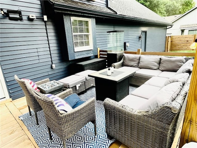 13106 E 57th St, Kansas City, MO 64133 - wooden terrace featuring outdoor lounge area