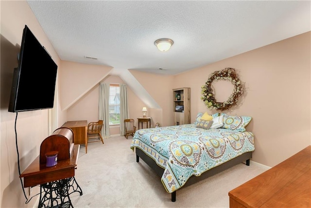 800 Ash Ct, Lansing, KS 66043 - bedroom featuring light colored carpet, a textured ceiling, and baseboards