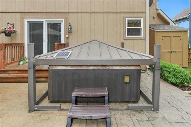 800 Ash Ct, Lansing, KS 66043 - view of patio / terrace with a covered hot tub and a wooden deck