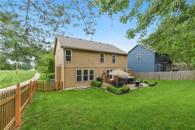 800 Ash Ct, Lansing, KS 66043 - back of house featuring a patio area, a gazebo, and an outdoor fire pit