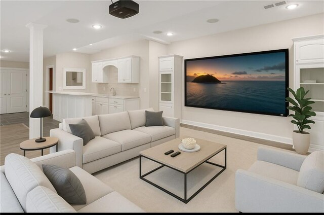 15142 Windsor Cir, Leawood, KS 66224 - cinema room featuring ornate columns, recessed lighting, and wet bar