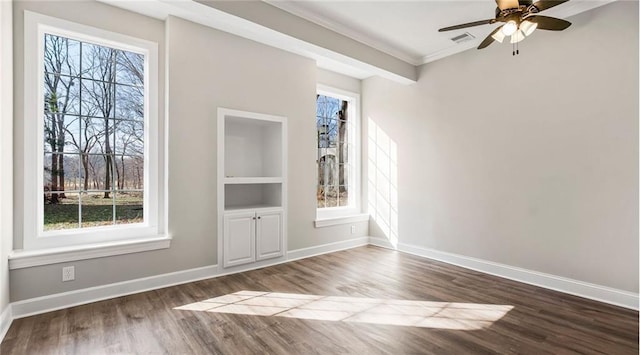 15142 Windsor Cir, Leawood, KS 66224 - unfurnished room with wood finished floors, ornamental molding, and a ceiling fan