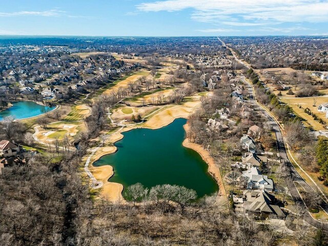 15142 Windsor Cir, Leawood, KS 66224 - aerial view of property's location featuring a nearby body of water and nearby suburban area