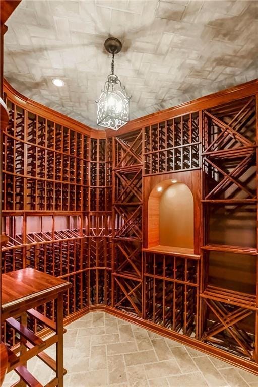 15142 Windsor Cir, Leawood, KS 66224 - wine room with a chandelier