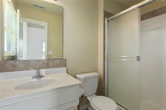 3104 SE 2nd St, Lees Summit, MO 64063 - bathroom with toilet, vanity, and a shower stall
