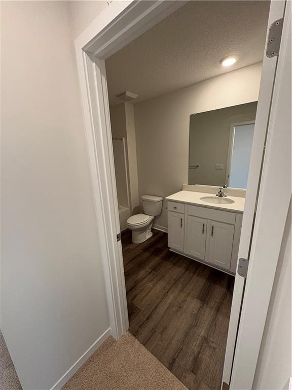 19620 W 201st St, Spring Hill, KS 66083 - full bathroom featuring vanity, toilet, baseboards, and a shower