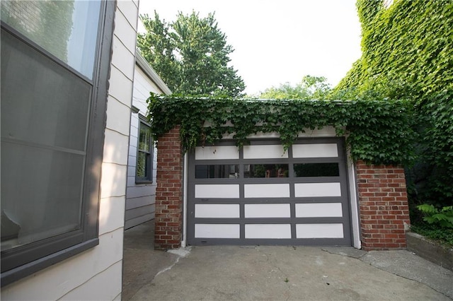 1017 Angelique St, Saint Joseph, MO 64501 - garage featuring asphalt driveway