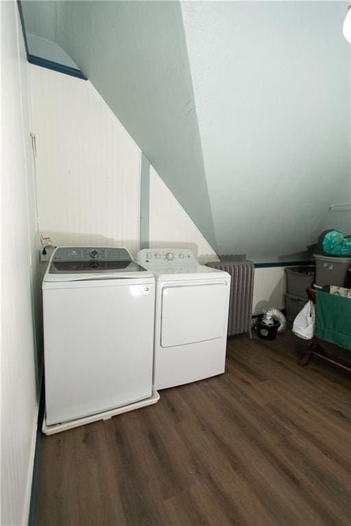 1017 Angelique St, Saint Joseph, MO 64501 - laundry room featuring washer and clothes dryer and dark wood finished floors